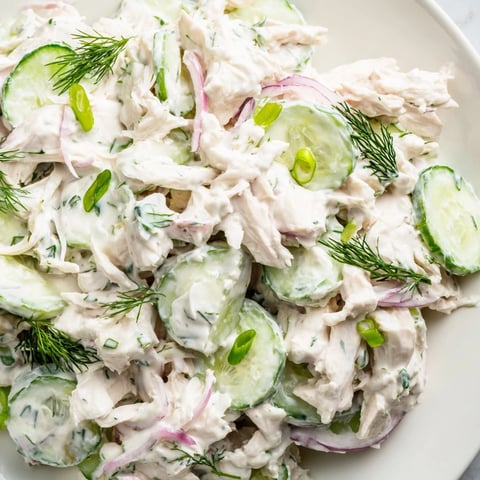 Freshly prepared Creamy Cucumber Chicken Salad features diced chicken and crisp cucumbers in a dill yogurt dressing.