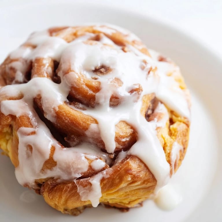 Freshly baked Cinnamon Rolls with soft spirals and cinnamon sugar filling, ready to be served.
